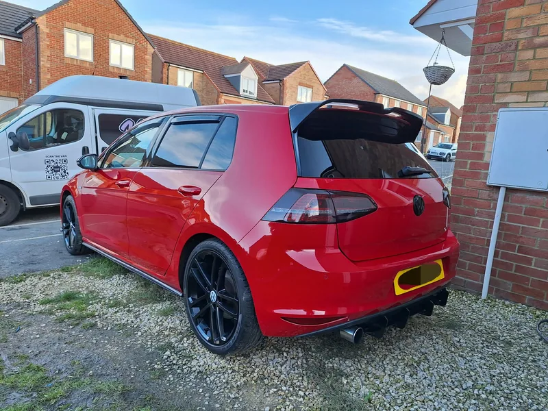 Red Golf R freshly valeted next to the Valiant Carpet & Upholstery Cleaning van